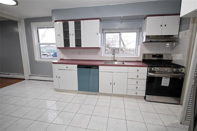 kitchen featuring stainless steel appliances, sink, a wealth of natural light, and white cabinets