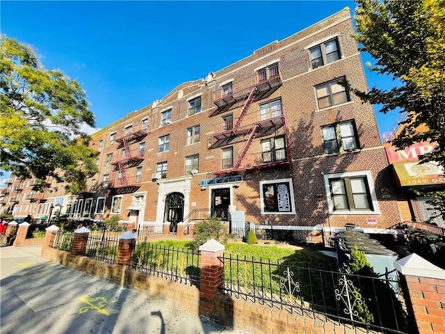 3045 Ocean Pkwy Unit 4D, Brooklyn, NY 11235 - view of apartment building / complex featuring a fenced front yard