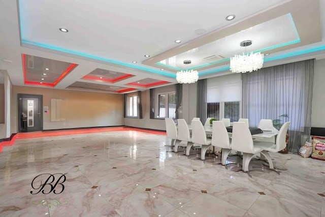 dining space featuring a raised ceiling, coffered ceiling, and a notable chandelier