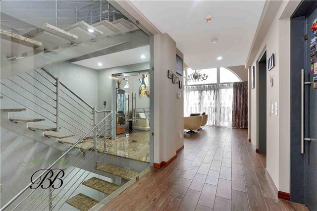 corridor featuring hardwood / wood-style flooring