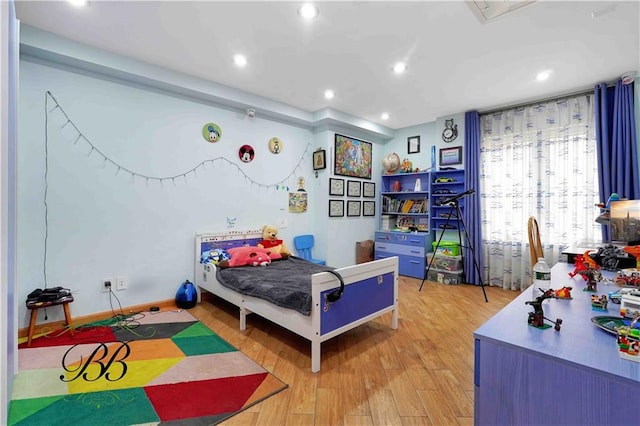 bedroom with wood-type flooring