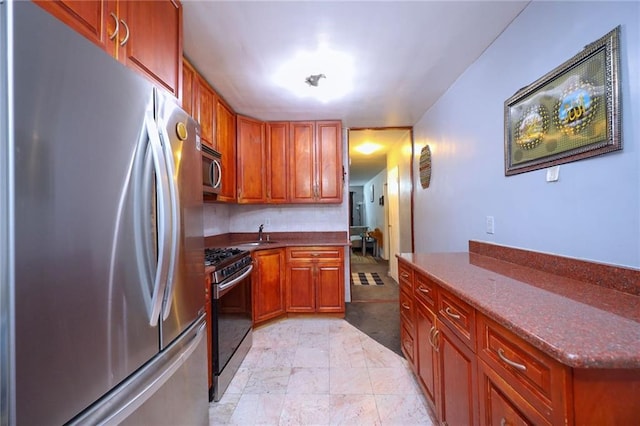 kitchen with sink and stainless steel appliances