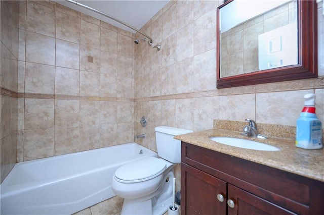 full bathroom with vanity, tiled shower / bath combo, decorative backsplash, toilet, and tile walls