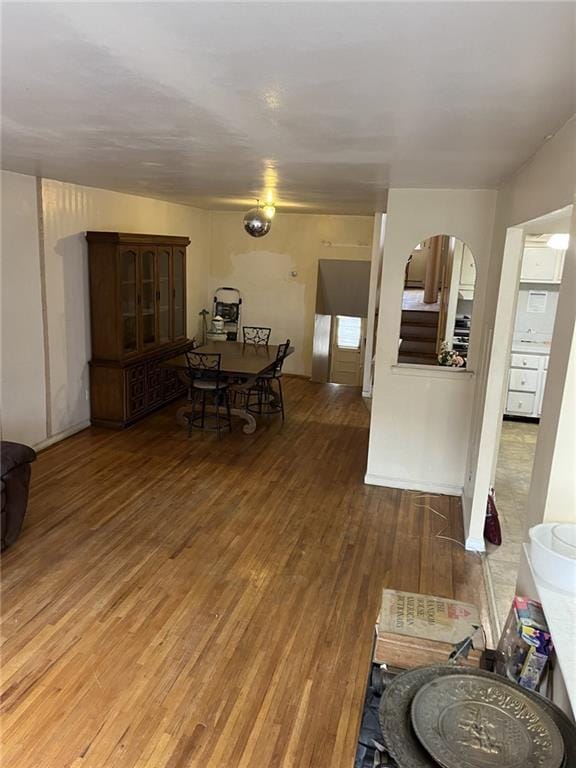 dining area featuring wood-type flooring