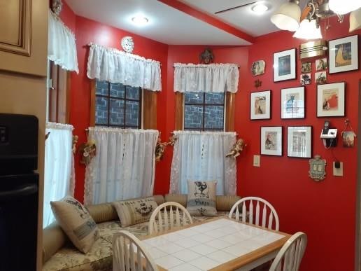 dining area with ceiling fan