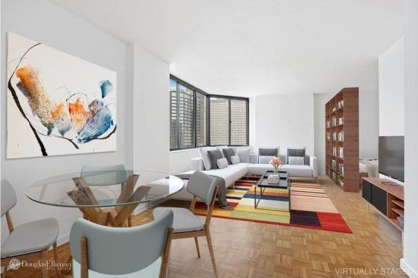 living room featuring light parquet flooring