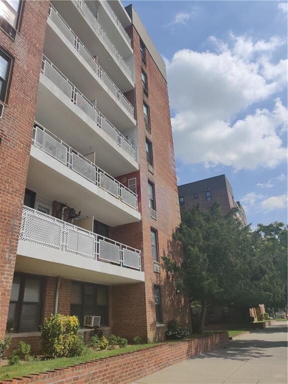 view of building exterior featuring cooling unit