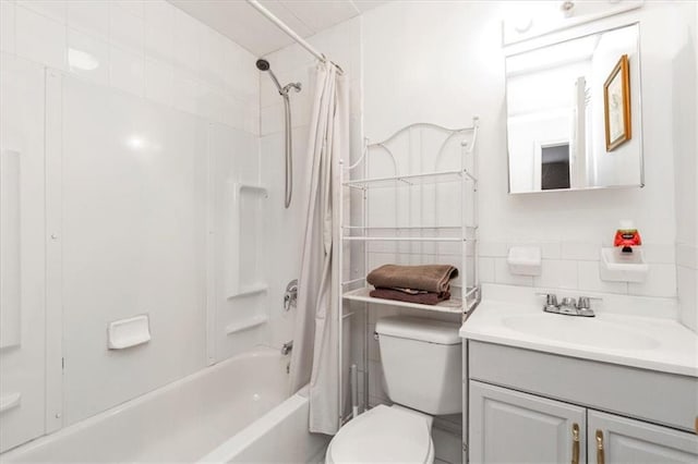 full bathroom with decorative backsplash, shower / bath combination with curtain, toilet, and vanity