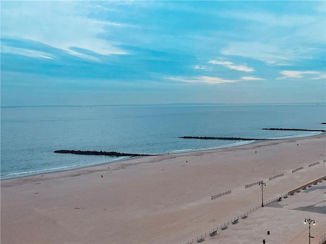 view of water feature with a beach view