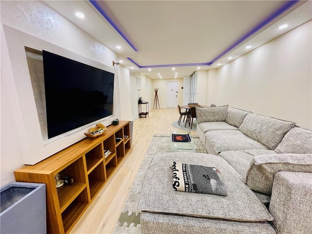 living room with recessed lighting and wood finished floors