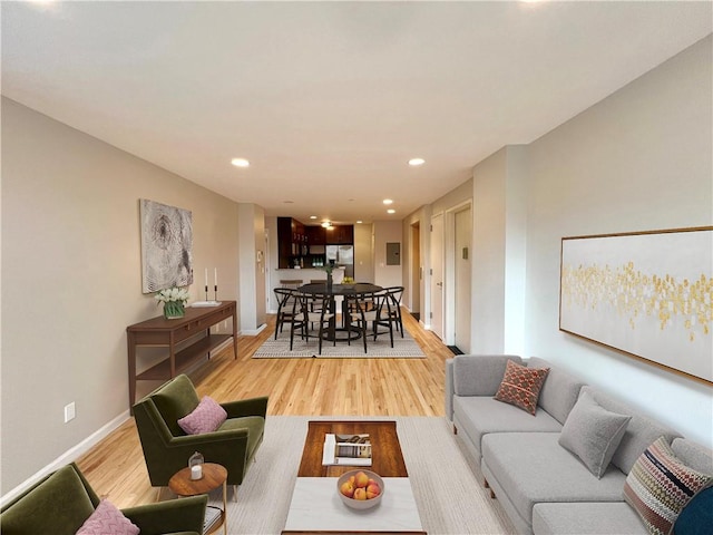 living room with light hardwood / wood-style floors