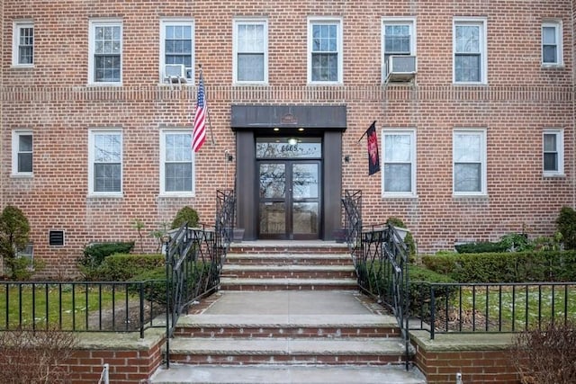 entrance to property featuring french doors