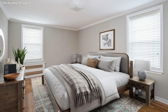6665 Colonial Rd Unit 2F, Brooklyn, NY 11220 - bedroom featuring wood finished floors, crown molding, and baseboards