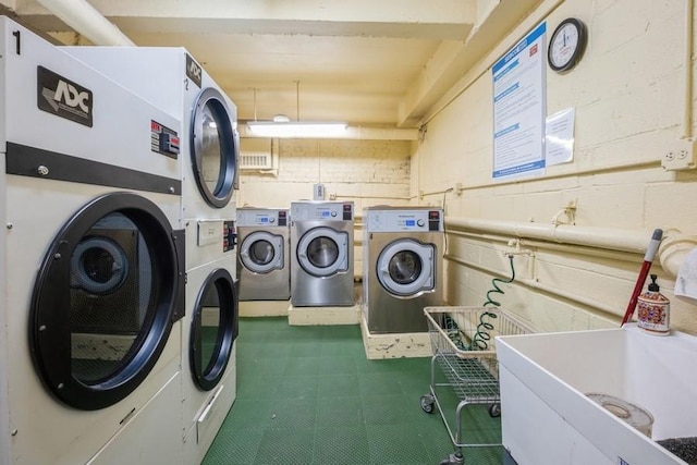 6665 Colonial Rd Unit 2F, Brooklyn, NY 11220 - community laundry featuring washing machine and dryer and tile patterned floors