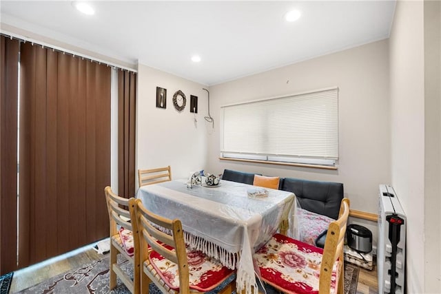 dining area featuring hardwood / wood-style floors