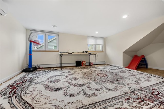 interior space featuring hardwood / wood-style flooring and a baseboard radiator