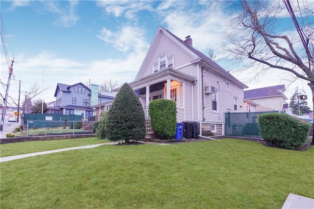 view of home's exterior featuring fence, a chimney, and a lawn