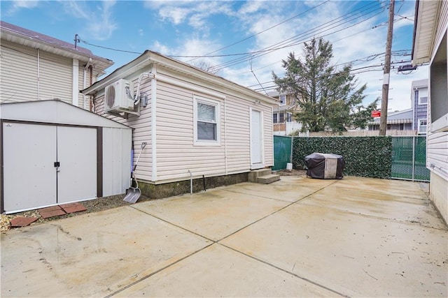 202 Watchogue Rd, Staten Island, NY 10314 - back of house featuring entry steps, a patio area, and a cooling unit