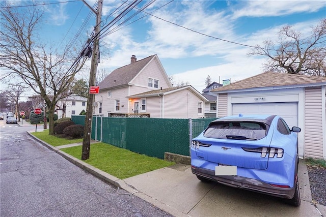 202 Watchogue Rd, Staten Island, NY 10314 - view of side of home featuring a garage