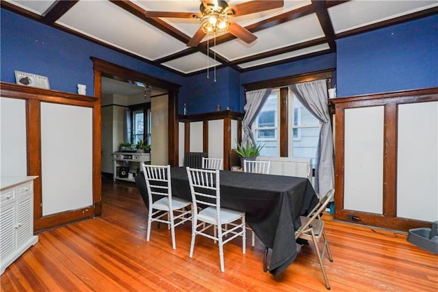 202 Watchogue Rd, Staten Island, NY 10314 - dining area with coffered ceiling, plenty of natural light, wood finished floors, ceiling fan, and beam ceiling