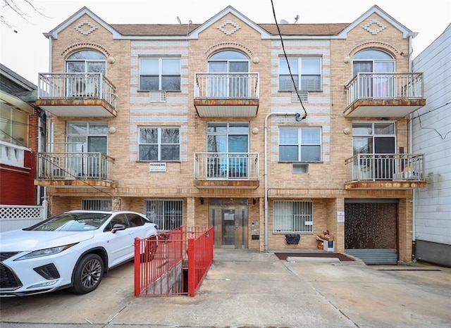 view of property featuring a balcony