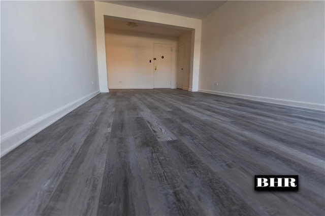 interior space with dark hardwood / wood-style flooring