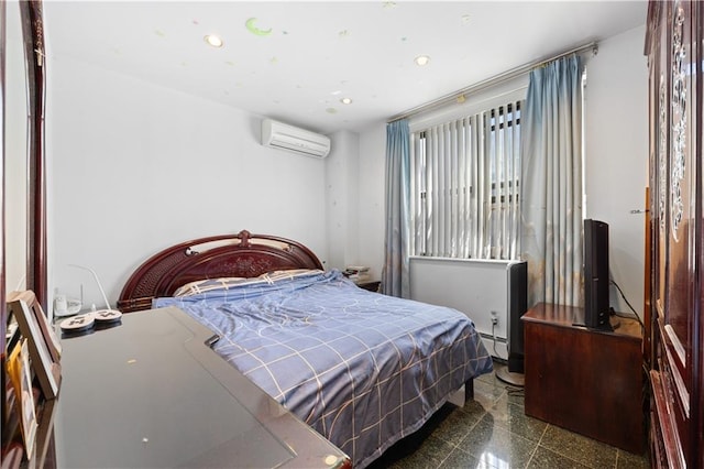 bedroom featuring an AC wall unit and baseboard heating