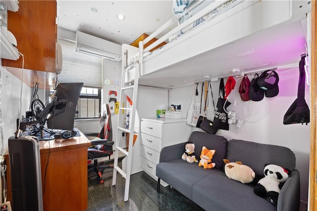 bedroom featuring a wall unit AC