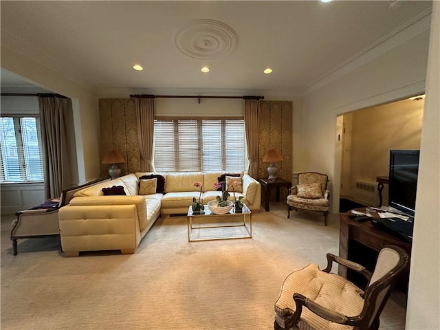 living room featuring a healthy amount of sunlight, light colored carpet, and crown molding