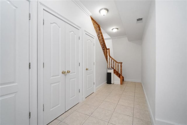 hallway with light tile patterned flooring