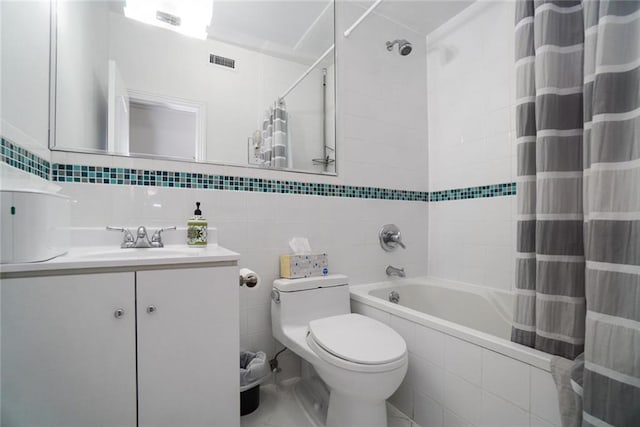 full bathroom with shower / tub combo with curtain, tile walls, vanity, decorative backsplash, and toilet