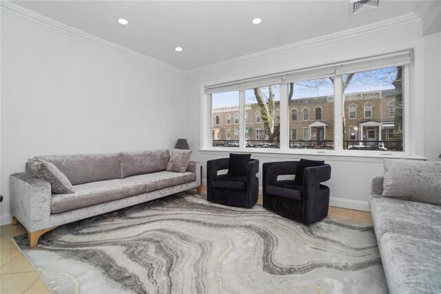 tiled living room with crown molding