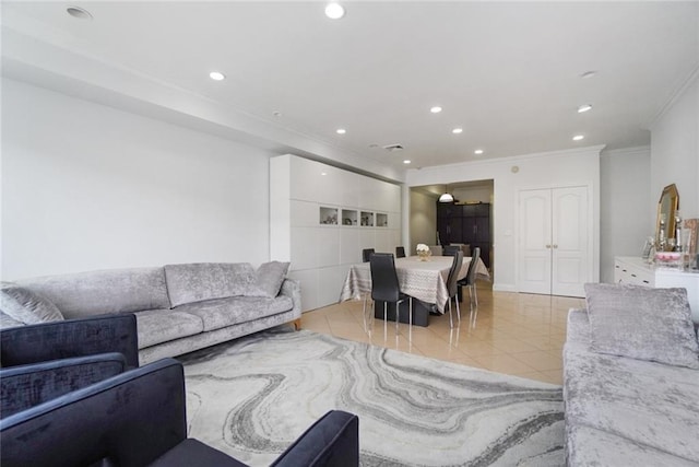 tiled living room featuring ornamental molding