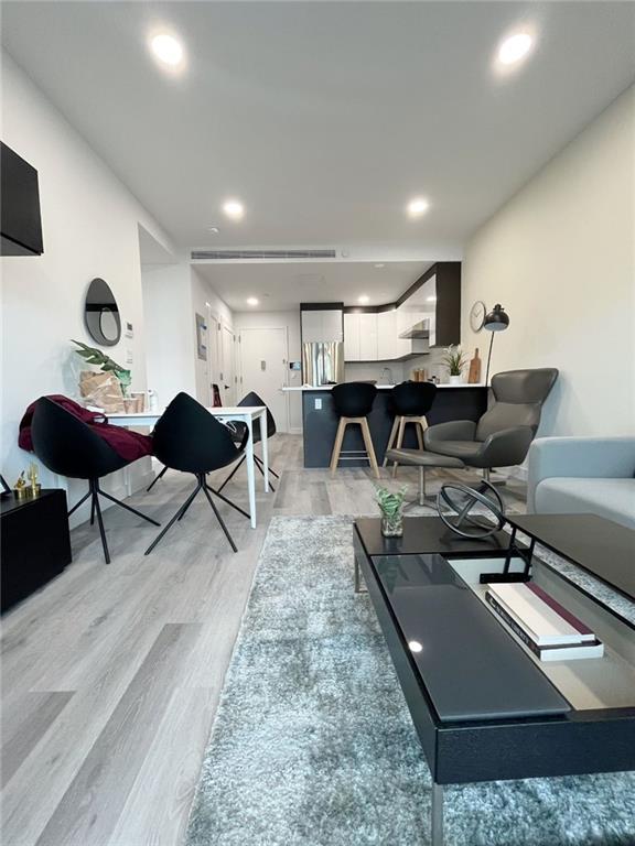 living room featuring light hardwood / wood-style floors