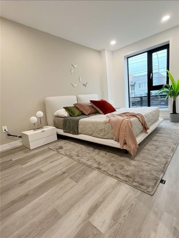 bedroom featuring light hardwood / wood-style flooring