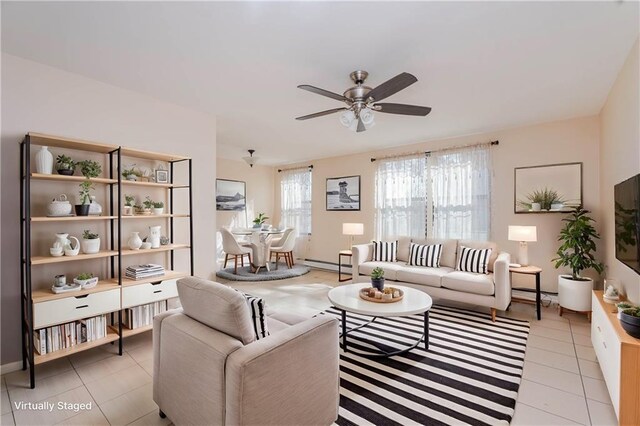 tiled spare room featuring ceiling fan and a wealth of natural light