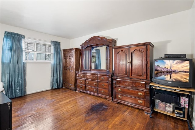 bedroom featuring hardwood / wood-style floors