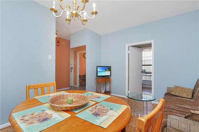 dining room featuring light hardwood / wood-style flooring and a chandelier