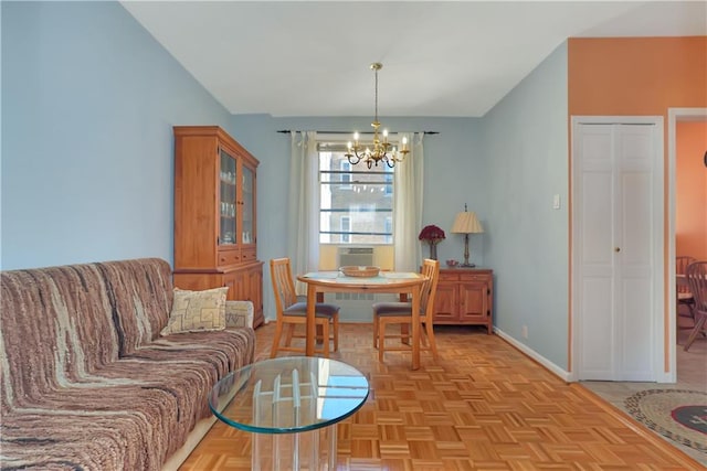 interior space featuring a notable chandelier and light parquet flooring