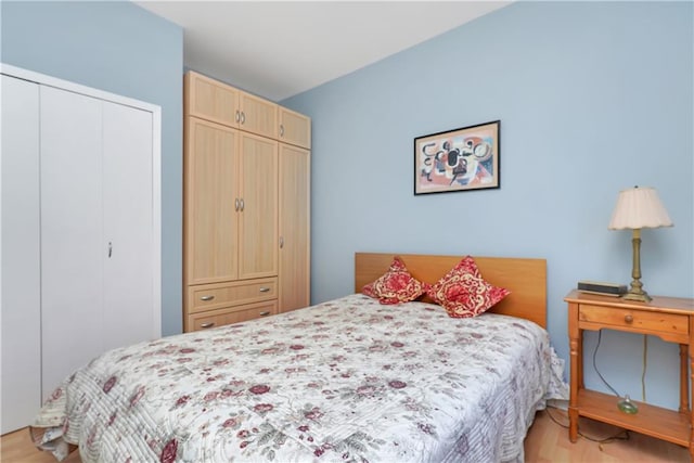 bedroom featuring light wood-type flooring