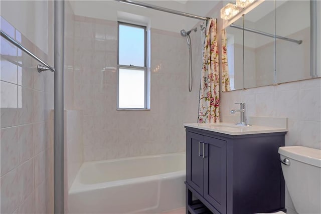 full bathroom with vanity, toilet, shower / bathtub combination with curtain, tile walls, and tasteful backsplash