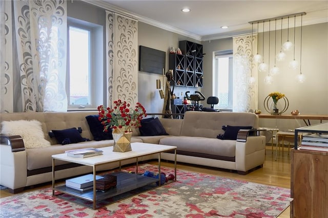 interior space with ornamental molding and hardwood / wood-style flooring