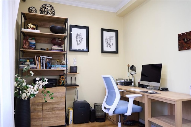 home office with crown molding and hardwood / wood-style floors