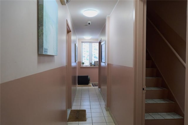 corridor featuring light tile patterned flooring