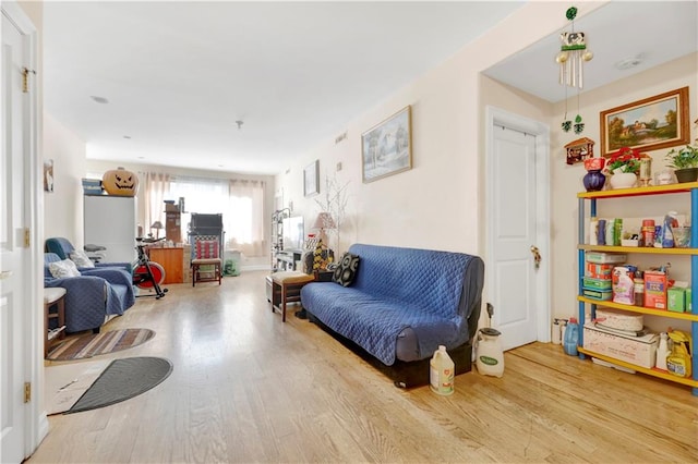 sitting room featuring hardwood / wood-style flooring