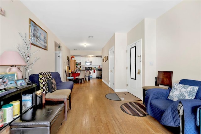 interior space with light hardwood / wood-style flooring