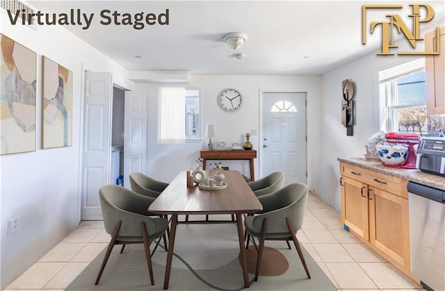 14 Webers Ct, Brooklyn, NY 11235 - dining space featuring light tile patterned floors