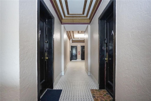 341 86th St, Brooklyn, NY 11209 - hall with tile patterned floors, a textured wall, baseboards, ornamental molding, and attic access