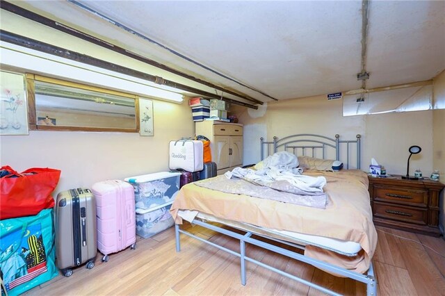 bedroom featuring light hardwood / wood-style flooring