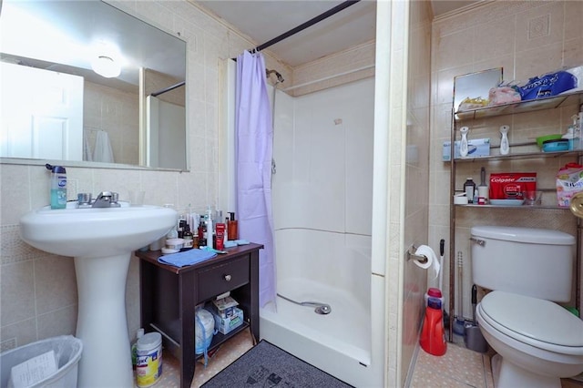 bathroom with walk in shower, tile patterned floors, backsplash, toilet, and tile walls